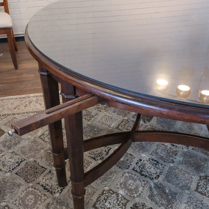 Round Dining Table with Crescent Leaves