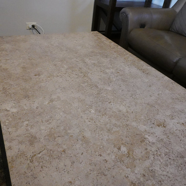 Orig Price $1500 - Galesbury Travertine and Iron Cocktail Table