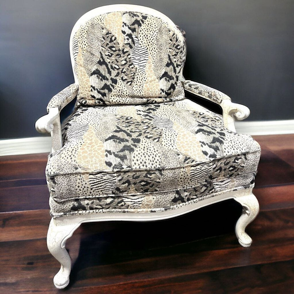 Custom Upholstered Animal Print Arm Chair with Accent Pillow and Ottoman