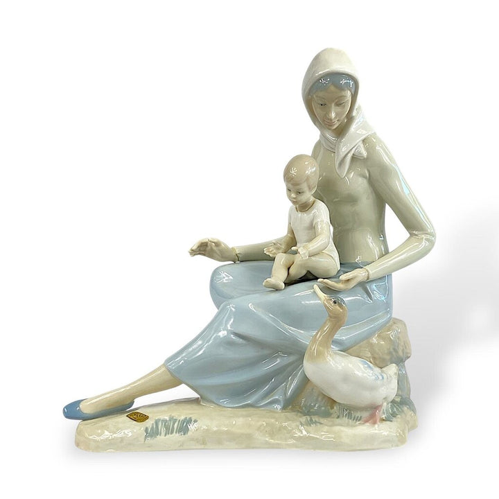 #148 Mother and Child Sitting with Duck