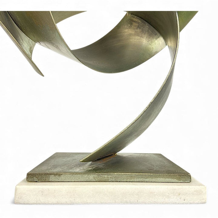 Metal Ribbon Sculpture on Marble