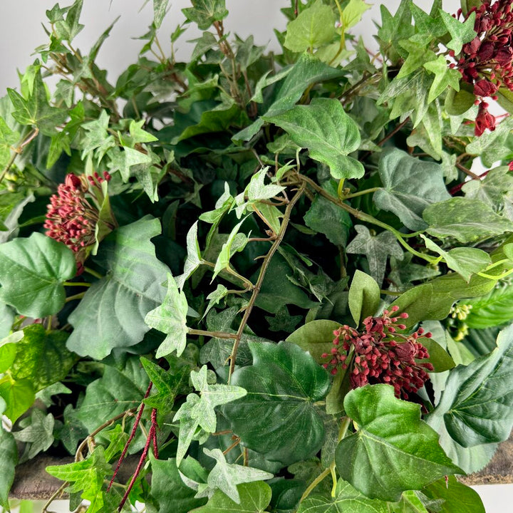 Floral Plant in Footed Planter